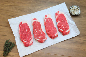 Goodstock Angus Beef -- Boneless Strip Steaks